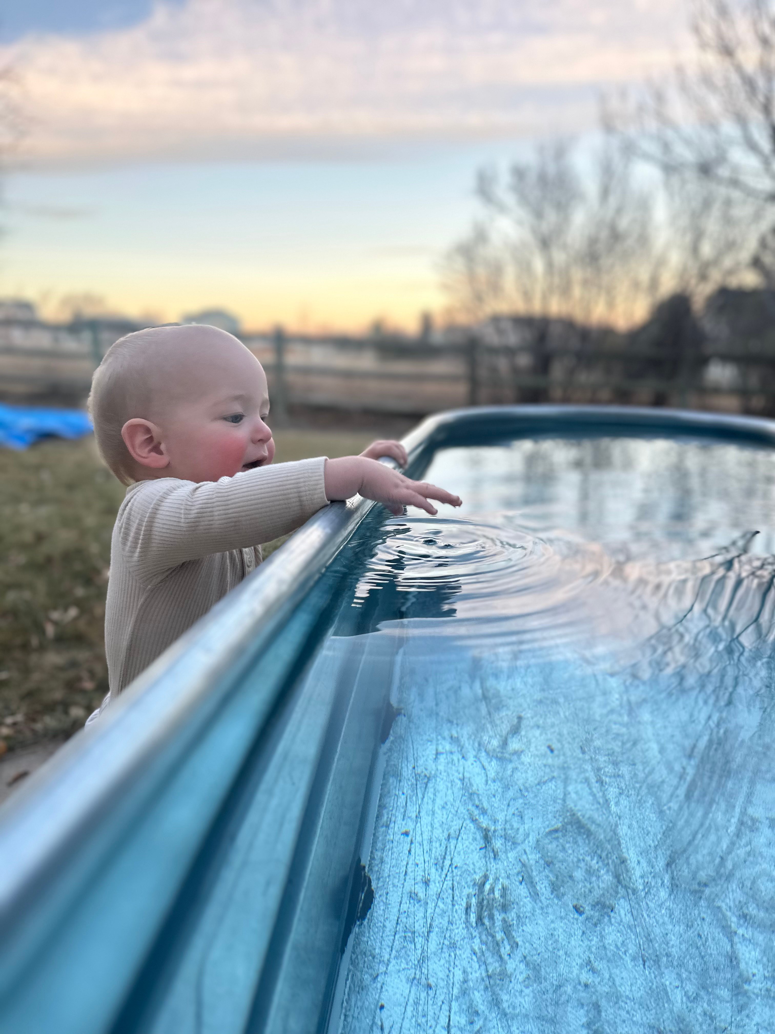 Palmer and his son near the cold plunge trough